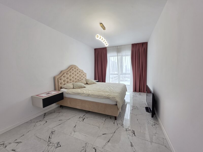 Auchan Titan, Complexul IRAM Residence.