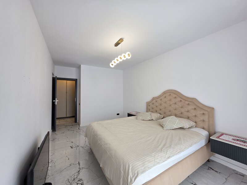 Auchan Titan, Complexul IRAM Residence.