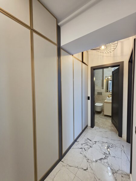 Auchan Titan, Complexul IRAM Residence.