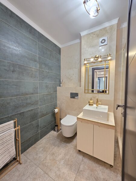 Auchan Titan, Complexul IRAM Residence.