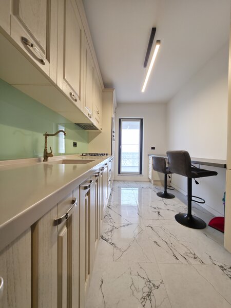 Auchan Titan, Complexul IRAM Residence.